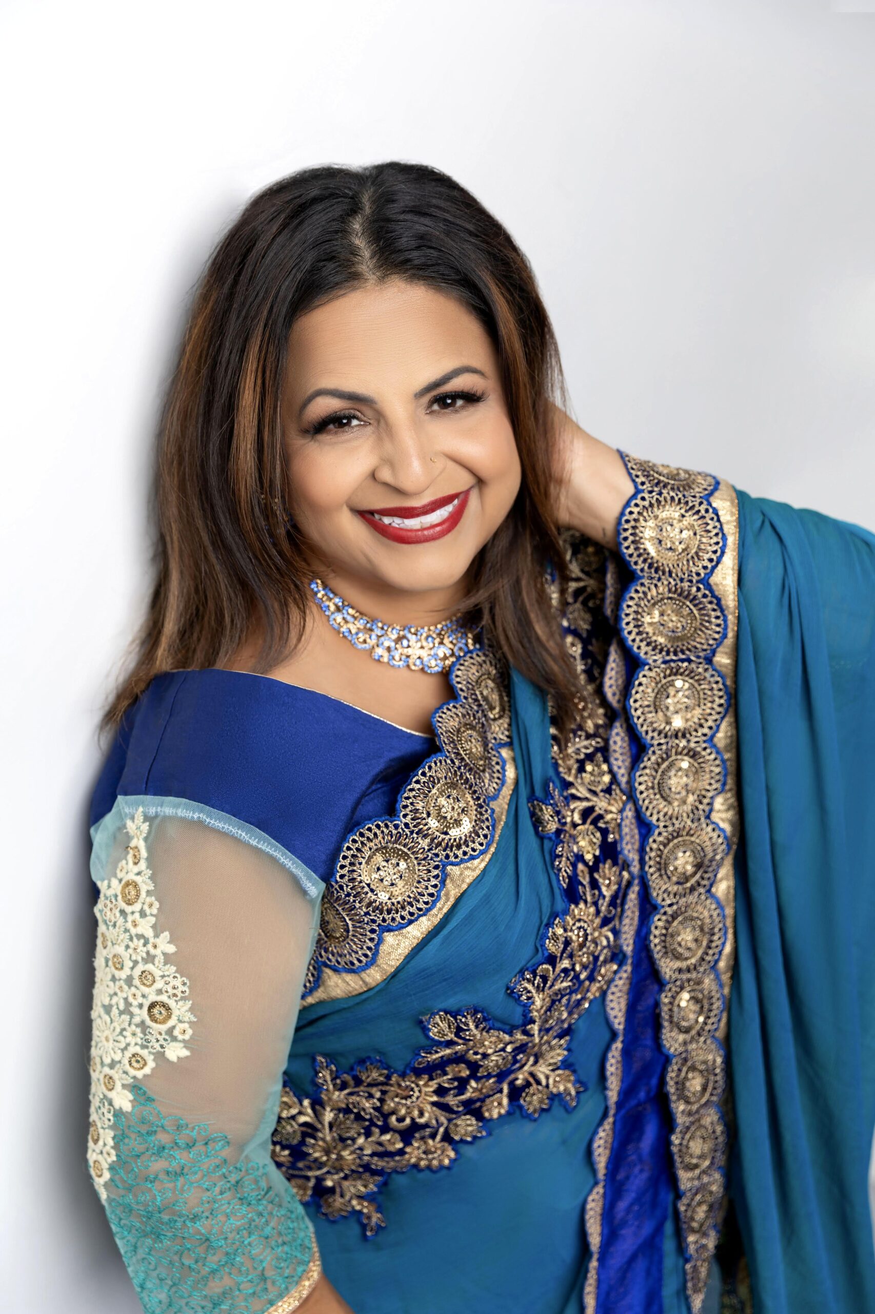 Zafira in a blue saree
